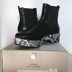 Eva Snakeskin Flatforms